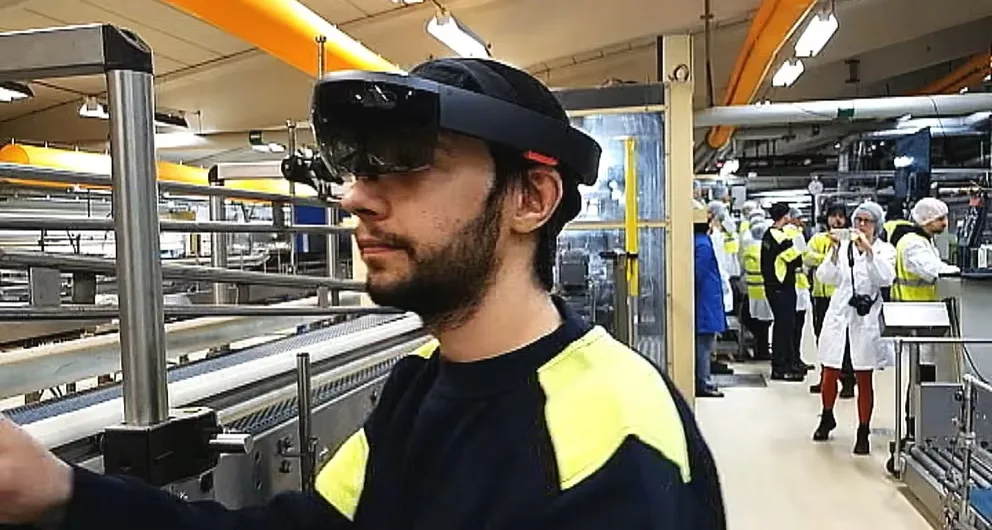 A Kopparbergs employee wearing the HoloLens on the bottling line.